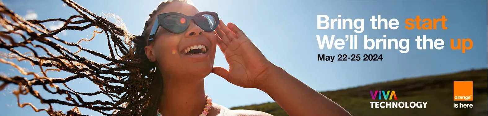 young woman smiling hair in the wind VivaTech image